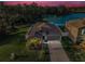 Beautiful single-Gathering home features an attached two-car garage, lush lawn, and a waterfront view at 36419 Flats St, Zephyrhills, FL 33541