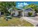 Charming single-story home featuring an attached single-car garage and a well-maintained front lawn at 3741 Appleton Ct, Palm Harbor, FL 34684