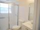 Clean bathroom with shower, toilet and sink with vanity at 4009 Triggerfish Dr, Hernando Beach, FL 34607