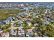 Property boasts a picturesque location amidst lush greenery and winding waterways at 4237 Marine Pkwy, New Port Richey, FL 34652