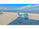 Relaxing beach scene with beach furniture, providing a comfortable spot to enjoy the calming ocean breeze at 4237 Marine Pkwy, New Port Richey, FL 34652