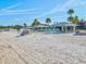Beautiful beach featuring picnic cabanas and seating area, offering a tranquil retreat for residents at 4237 Marine Pkwy, New Port Richey, FL 34652
