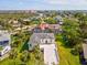 Well-manicured lawn, with a long drive on a clear day offering ample parking and beautiful curb appeal at 4237 Marine Pkwy, New Port Richey, FL 34652