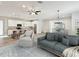 Bright and airy living space seamlessly connects to the modern kitchen and dining area, ideal for relaxation and gatherings at 4237 Marine Pkwy, New Port Richey, FL 34652