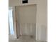 Spacious walk-in closet ready to be finished for optimal storage in a home at 4557 Garnet Dr # 102, New Port Richey, FL 34652
