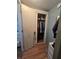 A look inside the bedroom closet with sliding doors, shelves, and storage space at 5102 Pigeon Plum Cir, New Port Richey, FL 34653