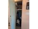 Hallway closet with shelving and clothes storage at 5102 Pigeon Plum Cir, New Port Richey, FL 34653