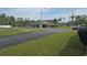 Exterior image of community clubhouse and landscaping at 5102 Pigeon Plum Cir, New Port Richey, FL 34653