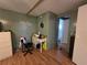 A desk area with drawers is tucked into the main bedroom, with access to the closet and bathroom at 5102 Pigeon Plum Cir, New Port Richey, FL 34653