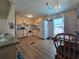 Cozy kitchen with wooden floors, and white appliances at 5102 Pigeon Plum Cir, New Port Richey, FL 34653