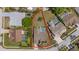 Aerial shot showing the property's layout, pool, outdoor space, and proximity to neighboring homes at 5412 Merkin Pl, New Port Richey, FL 34655