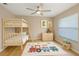 Cozy bedroom with bunk beds and playful decor, perfect for  at 5412 Merkin Pl, New Port Richey, FL 34655