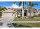 Charming single-Gathering residence featuring a manicured lawn and beautiful landscaping at 5412 Merkin Pl, New Port Richey, FL 34655