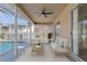 Covered patio with seating area overlooking the pool at 5412 Merkin Pl, New Port Richey, FL 34655