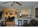 Modern kitchen with breakfast bar, open to the dining area, and perfect for entertaining at 6037 Chesham Dr # 3, New Port Richey, FL 34653
