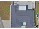Birds eye view of house's roof, patio, landscaping and exterior at 7221 Westwind Dr, Port Richey, FL 34668