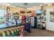 Well-stocked golf shop with golf bags, clothing, and accessories for a complete golf experience at 7511 Melogold Cir, Land O Lakes, FL 34637