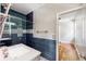 Bathroom featuring a shower, granite counters, and modern fixtures at 7925 Calindra Ct, Trinity, FL 34655