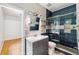 Bathroom featuring a shower, granite counters, and modern fixtures at 7925 Calindra Ct, Trinity, FL 34655