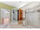 Spa-like bathroom with walk-in shower, sauna and access to a spacious bedroom at 7925 Calindra Ct, Trinity, FL 34655