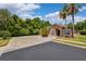 Charming single-Gathering home with a spacious driveway and mature trees creating a private setting at 7925 Calindra Ct, Trinity, FL 34655