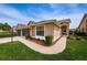 Charming single-story home featuring a well-manicured lawn, brown trim, and an attached two-car garage at 9636 Brookdale Dr, New Port Richey, FL 34655