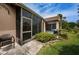 Screened in patio is visible from this view of the backyard at 9636 Brookdale Dr, New Port Richey, FL 34655