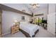 Cozy primary bedroom features vaulted ceiling, plush carpet, and sliding glass door to enclosed patio at 9636 Brookdale Dr, New Port Richey, FL 34655