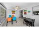 Enclosed patio offers tile floors, backyard access, and flexible space for relaxing or dining at 1074 Woodbrook S Dr, Largo, FL 33770