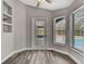 Bright room featuring access to the pool and a window offering natural light and views of the outdoors at 11379 Flower Ave, Weeki Wachee, FL 34613