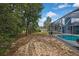 An inviting screened-in pool area, ideal for relaxation and enjoying the beautiful scenery at 11379 Flower Ave, Weeki Wachee, FL 34613