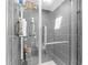 Contemporary bathroom with sleek glass shower and modern fixtures at 1156 Battersea Ave, Spring Hill, FL 34609