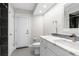 Modern bathroom with marble countertop, sleek fixtures, and a glass-enclosed shower at 1156 Battersea Ave, Spring Hill, FL 34609