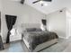 Comfortable main bedroom with contemporary design and natural light at 1156 Battersea Ave, Spring Hill, FL 34609