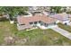 Charming single-story home featuring a well-manicured lawn and an attached two-car garage at 12087 Tallwood St, Spring Hill, FL 34608