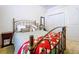Cozy bedroom with metal frame bed, patterned quilt, dresser, and window at 1218 Castle Ter, Tarpon Springs, FL 34689