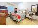 Cozy bedroom with metal frame bed, patterned quilt, dresser, and window at 1218 Castle Ter, Tarpon Springs, FL 34689