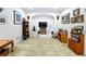 Large bonus room area with a carpeted floor and neutral decor at 1218 Castle Ter, Tarpon Springs, FL 34689