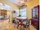 Charming breakfast nook with a marble-topped table next to a bright window at 1218 Castle Ter, Tarpon Springs, FL 34689