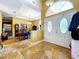 Spacious foyer featuring decorative tile flooring, high ceilings, and a grand double-door entrance at 1218 Castle Ter, Tarpon Springs, FL 34689