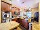 Well-equipped kitchen featuring stainless steel appliances, granite countertops, and pendant lighting at 1218 Castle Ter, Tarpon Springs, FL 34689
