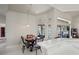 Breakfast nook featuring a charming wooden table and views of the sparkling pool at 12300 Drake Ln, Spring Hill, FL 34609