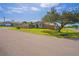 Charming single-story home with a well-manicured lawn and mature tree in a desirable neighborhood at 12300 Drake Ln, Spring Hill, FL 34609
