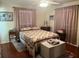 Comfortable bedroom with a plush bed, neutral walls, and natural light at 1332 Inca Ave, Spring Hill, FL 34608