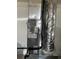Image features a modern HVAC system with visible filter and ductwork at 1332 Inca Ave, Spring Hill, FL 34608