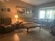 Cozy living room with comfortable seating, natural light, and neutral tones at 1332 Inca Ave, Spring Hill, FL 34608