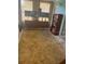 Bright sunroom that offers vintage mid-century modern furnishings at 1332 Inca Ave, Spring Hill, FL 34608