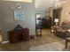 Inviting living room with tile floors, neutral tones, and vintage furnishings at 1332 Inca Ave, Spring Hill, FL 34608