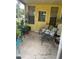 Porch filled with chairs, decorations, and plants at 1332 Inca Ave, Spring Hill, FL 34608