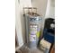 Standard-sized A.O. Smith water heater with visible pipes and connections at 1332 Inca Ave, Spring Hill, FL 34608